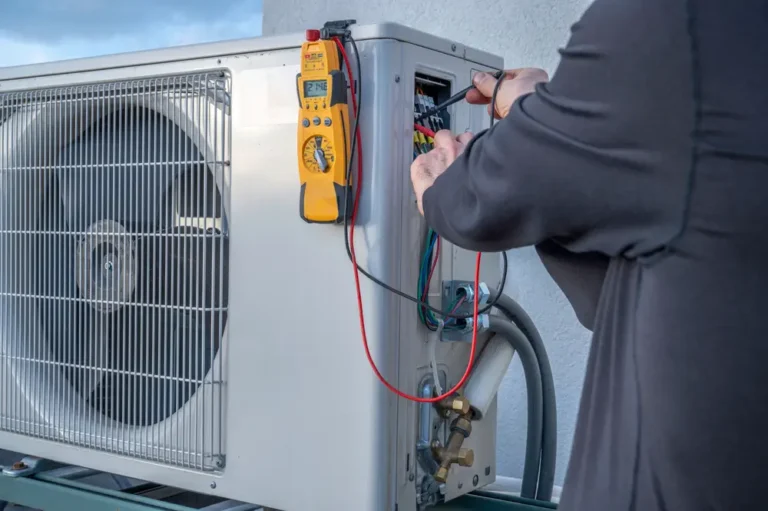 HVAC technician servicing a cooling system