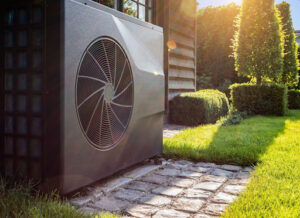 An outdoor heat pump unit installed outside of a home.