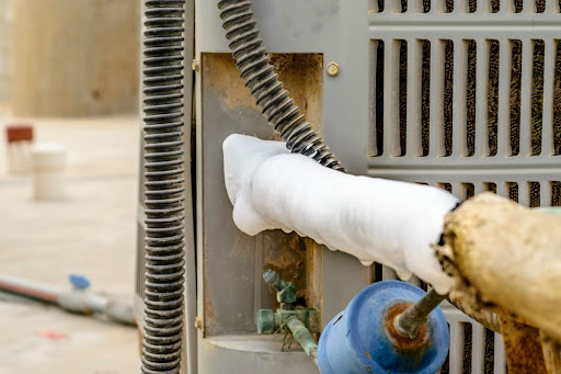Frozen line on outdoor AC unit.